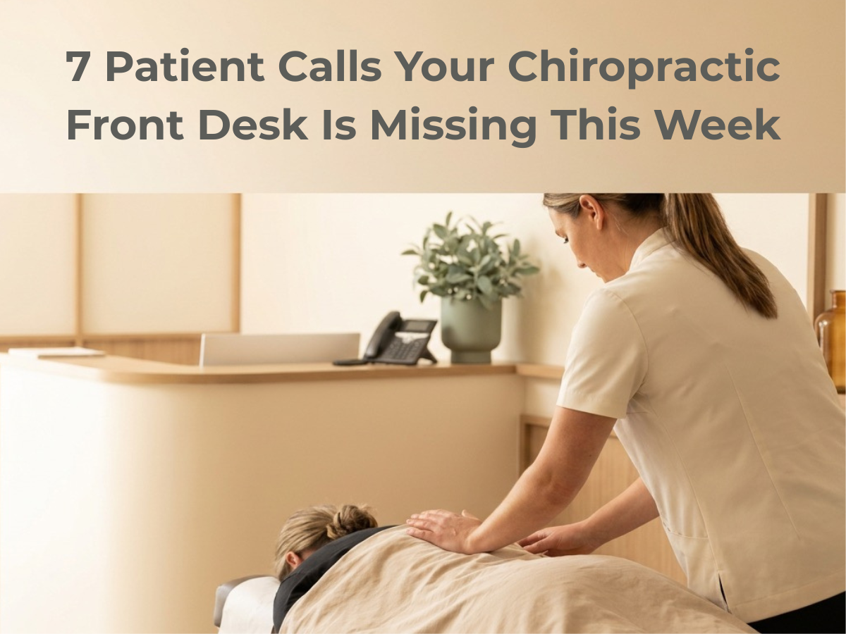 A chiropractor mid-adjustment with a patient while an empty front desk phone rings in the background.